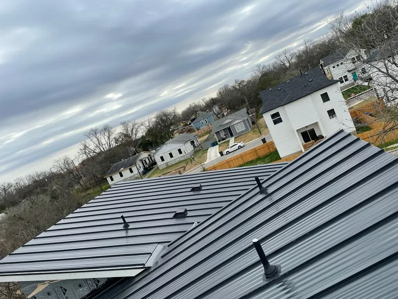 Standing seam metal roof panels with vents for Skylight Repair in Long Grove